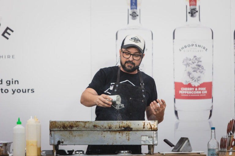 man doing cooking demonstration 768x511