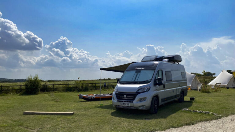 motorhome awning field paddleboard 768x431